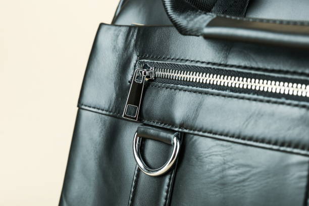 istock zipper on the bag close-up 1388034063