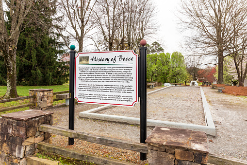 Waldensian Presbyterian Church: A natural soil Bocce court with a sign providing a history of the sport.  On Main St. in downtown.