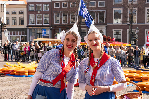 Alkmaar, The Netherlands, March 25, 2022; Dutch cheese girls at the first cheese market in Alkmaar of the year 2022.