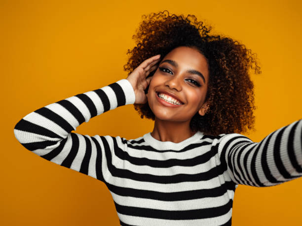 istock Beautiful afro woman 1388039916