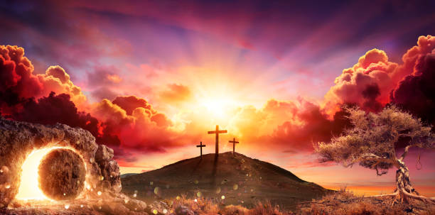 Resurrection - Crosses And Empty Tomb With Crucifixion At Sunrise - Abstract Defocused Lights stock photo