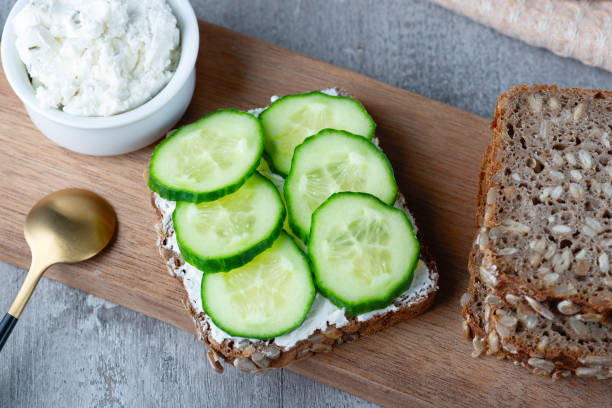 istock Healthy sandwich with white cottage cheese and cucumber 1388040975