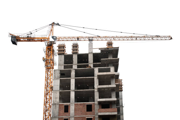 istock Construction yellow crane and frame of new multi-storey building on a white background 1388044630