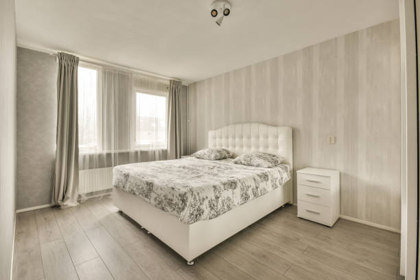 istock A small bedroom interior with a large bed 1388048022