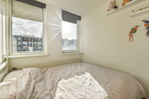 istock A small bedroom with a large double bed 1388048857