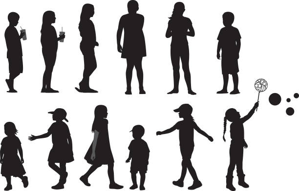 Children Silhouettes 5 Vector silhouettes of various children standing, running, and playing. junior high age stock illustrations