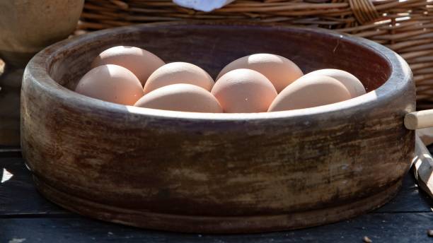 istock Wooden Bowl Containing Fresh Eggs. 1388049967