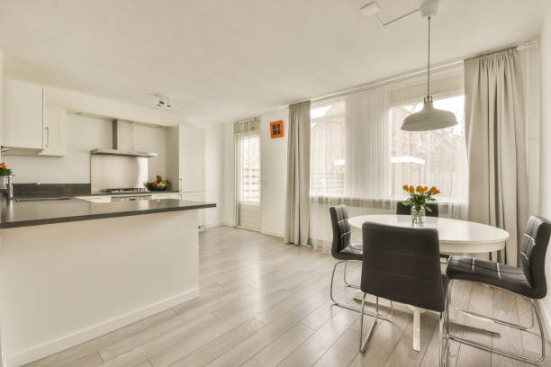 istock Interior of a small corner kitchen and a dining area 1388054464