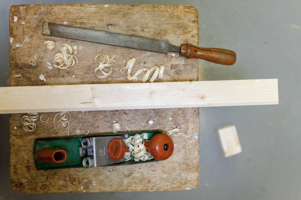 istock planer, file and wooden block on a stool 1388054540
