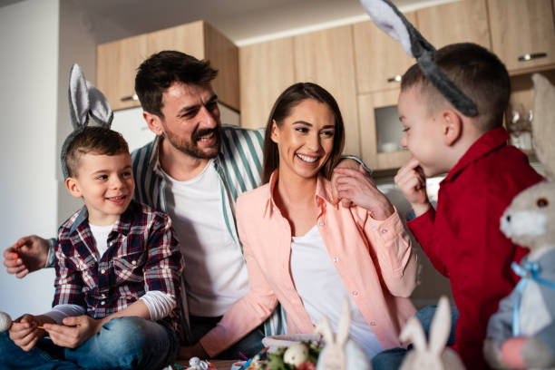 istock Happy smiling family celebrating Easter at home 1388062876