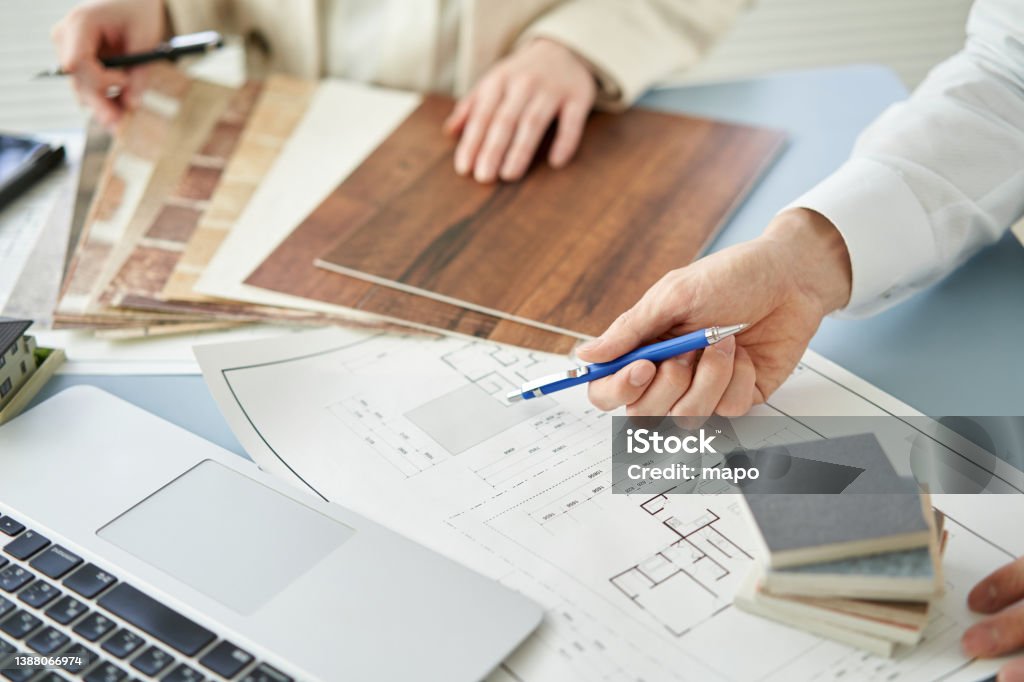 Asian architect designing a house Home Improvement Stock Photo