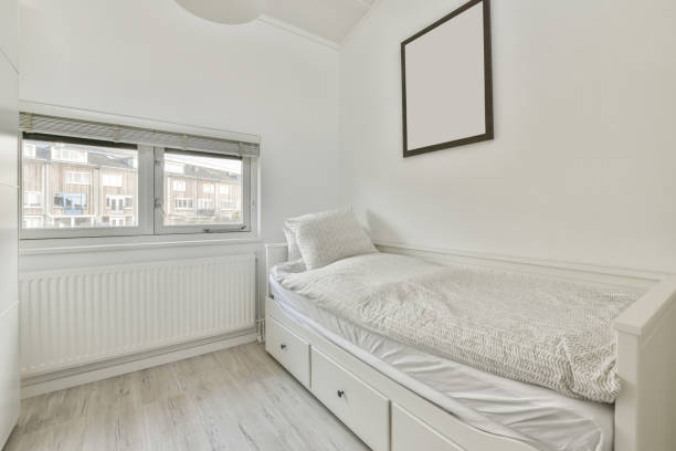 istock A small bedroom with a single bed 1388068445