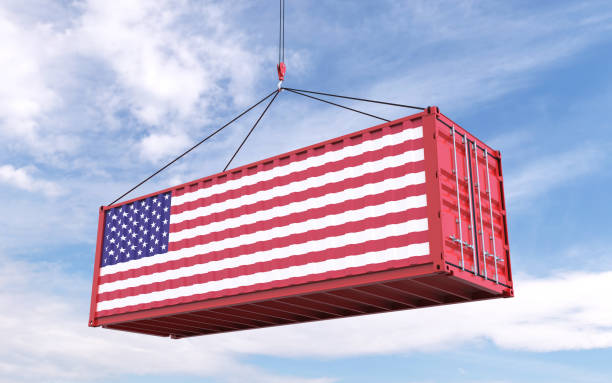 istock 3d Rendering of a shipping cargo container with American Flag loading sky in background stock photo 1388069936