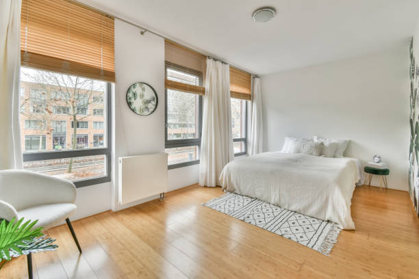 istock A spacious bedroom with a large white bed 1388074525