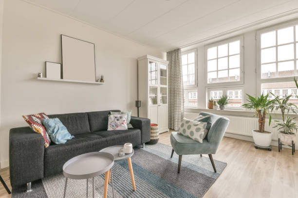 istock Cozy living room with a dark sofa 1388088577