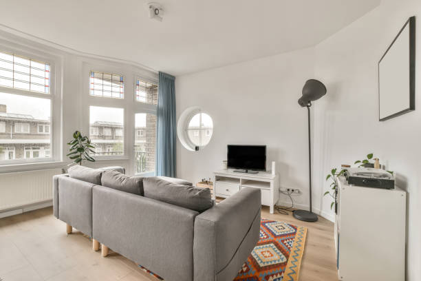istock A small living room with a gray sofa 1388089648