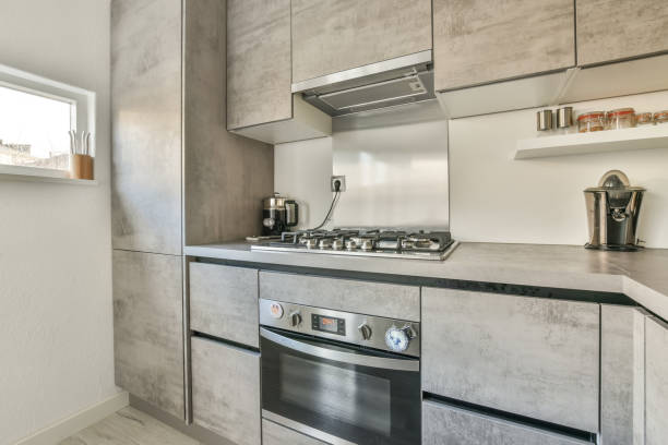 istock The interior of the kitchen in a gray design 1388092623