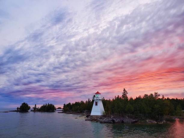 istock Secluded Lighthouse on Manatoulin Island During a Beautiful Sunset 1388098866