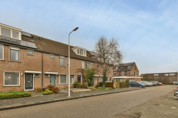 istock A small residential brick house with a lawn 1388100343