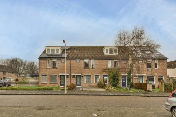 istock A small residential brick house with a lawn 1388101710