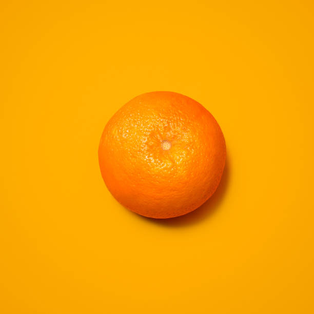 istock Shot of an orange against a studio background 1388102727
