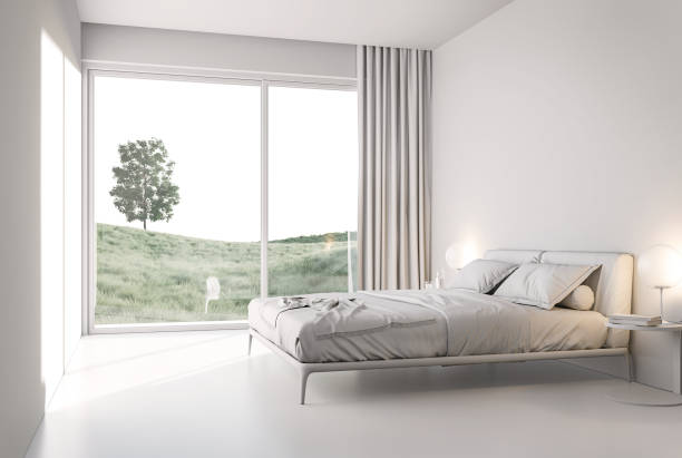 istock Minimal style white bedroom with meadow view 3d render 1388104945