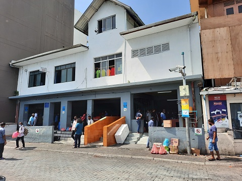 Day View of the business centers of the Maldives capital Male. Male is the capital and largest commercial center of the Maldives.  It's known for its mosques and colorful buildings.   Because of the capital and the big city, the shops are full of tourists.