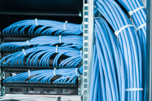 istock large group of UTP cables, Ethernet cables in rack cabinet 1388111730