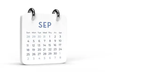 Photo of White September, SEP, desk calendar 2022 on blank background with copy space.