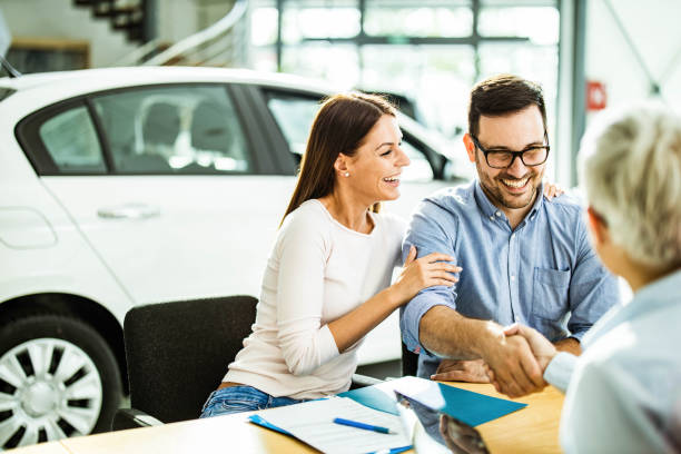 istock Congratulations, we have a deal about buying a car! 1388123714