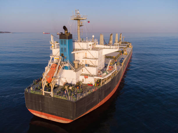 istock Large general cargo ship tanker bulk carrier, Top down aerial view. 1388125792