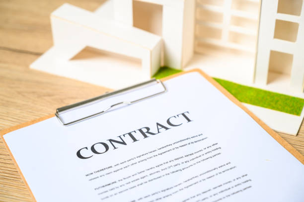 istock Contract documents for building a house for a purchase contract 1388128324