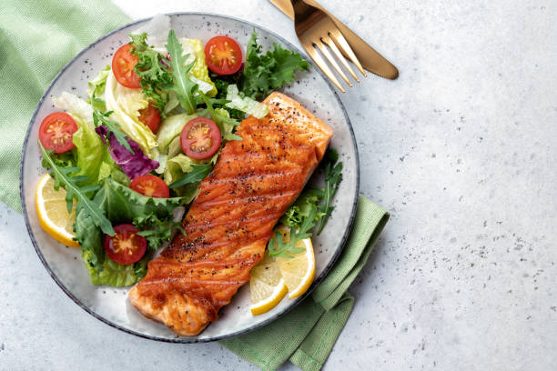 istock Grilled salmon and fresh salad 1388130287