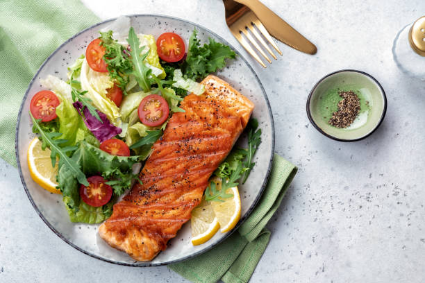 istock Grilled salmon and fresh salad 1388130834