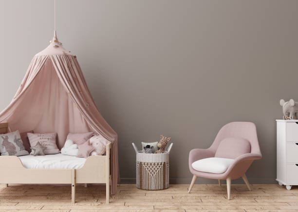 istock Empty brown wall in modern child room. Mock up interior in scandinavian style. Free, copy space for your picture, poster. Bed, toys. Cozy room for kids. 3D rendering. 1388131170
