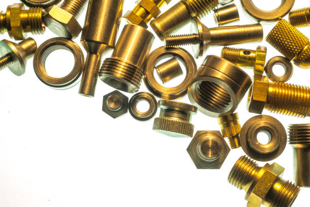 istock brass mechanical parts, industrial items on white background 1388131657