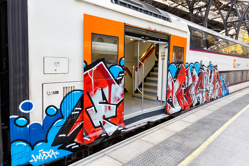 Barcelona, Spain - February 19, 2022: Graffiti on a train at Franca railway station in Barcelona, Spain.