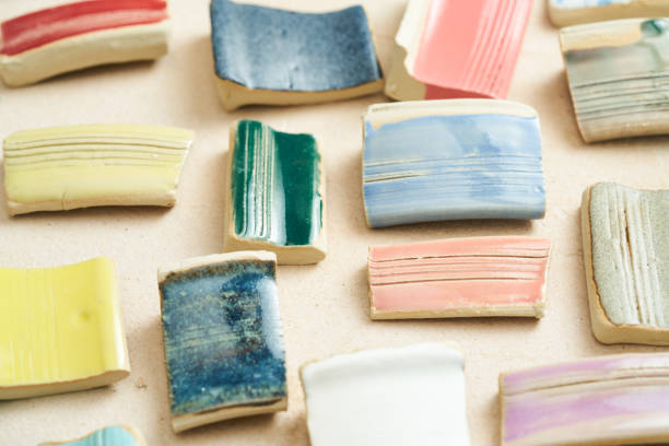Pottery, master classes, hobbies, hand made texture background. ceramic pieces painted with glaze