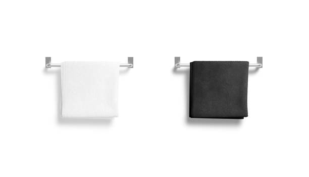 istock Blank black and white big towel on heated rail mockup 1388134503