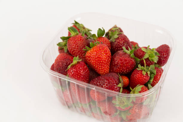 istock strawberries in bowl on white background 1388138262
