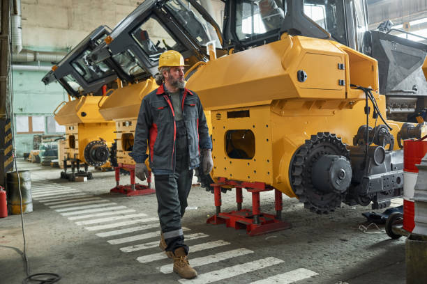 istock Foreman controlling the work in factory 1388138707