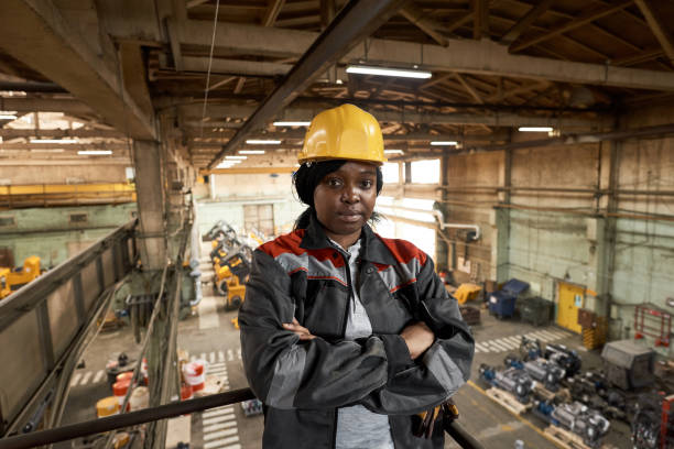 istock Female worker working in warehouse 1388139299