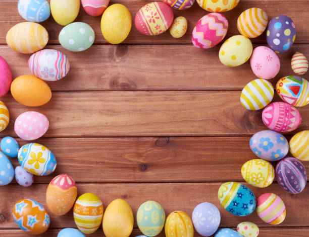 istock Happy Easter day eggs on wood background with copy space 1388140405