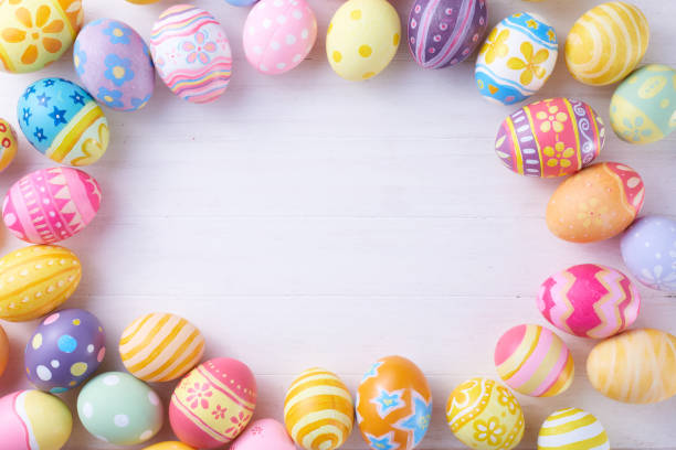 istock Happy Easter day eggs on wood background with copy space 1388140483
