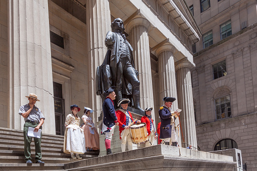 New York, USA - July 9, 2010:  Ceremony for declaration of independence in old costumes takes place at the Washington statue in front of federal Hall National Memorial  in New York, USA.