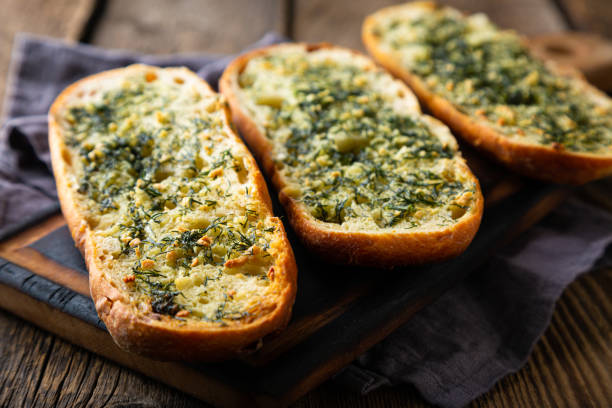 istock Crispy bread with garlic butter and dill 1388140718
