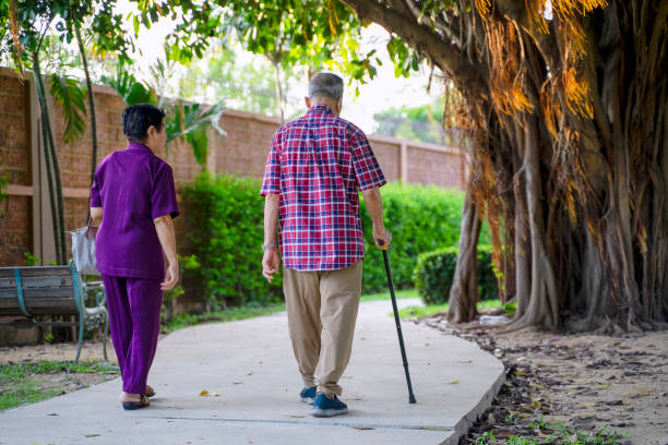 istock Active seniors are walking in the public park. 1388140855
