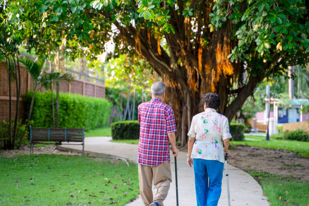 istock Active seniors are walking in the public park. 1388140856