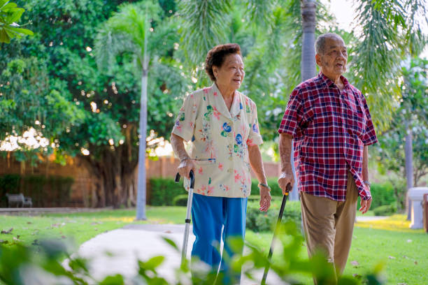 istock Active seniors are walking in the public park. 1388140867