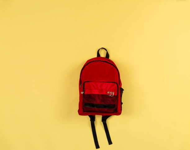 istock red bag on yellow background 1388141558